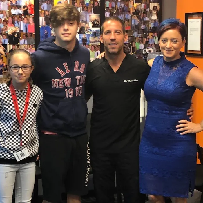 Dr. Ryan Alter with a patient family