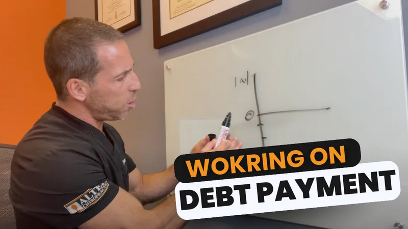 Working on Debt video