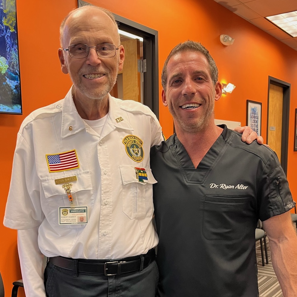 Robert Hemmer with Dr, Alter at Alter Chiropractic