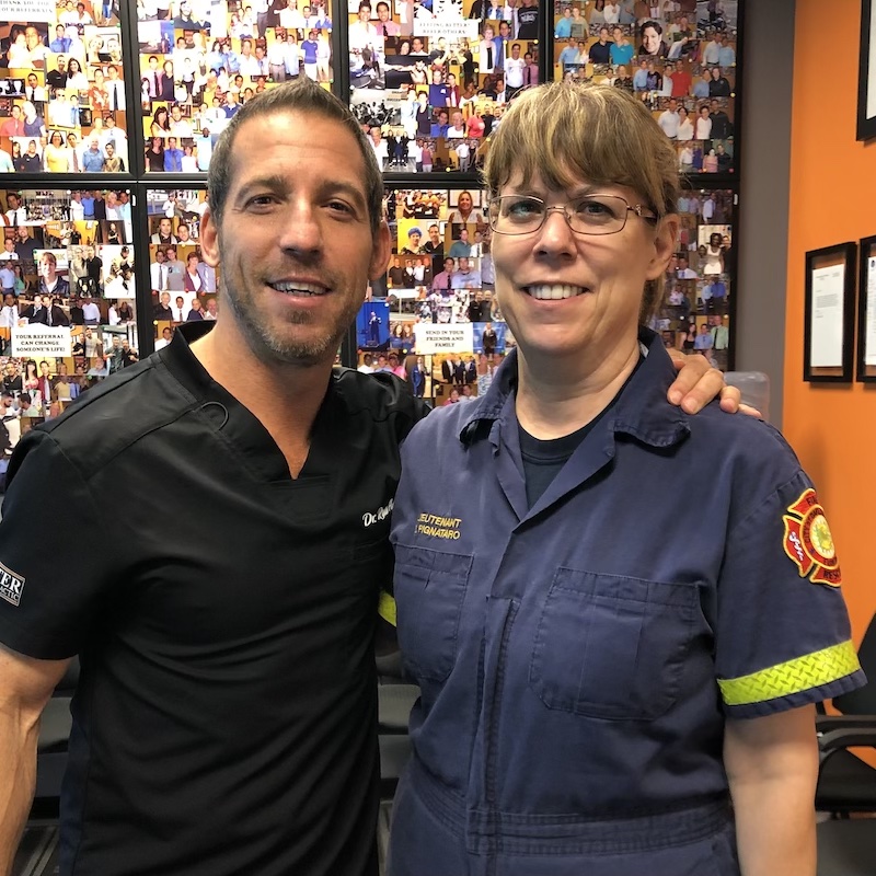 dr ryan alter, patient wearing blue shirt