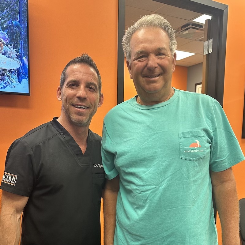 dr ryan alter together with patient wearing mint green shirt
