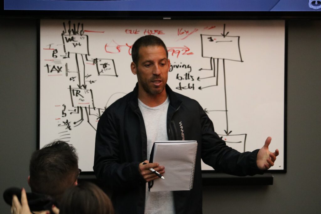 dr ryan alter speaking in front of guests