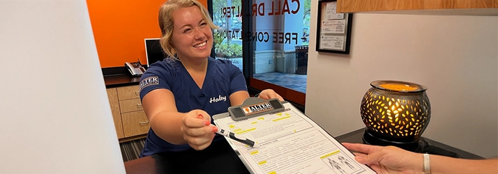 Chiropractic Delray Beach FL Haley Passing Patient Paperwork